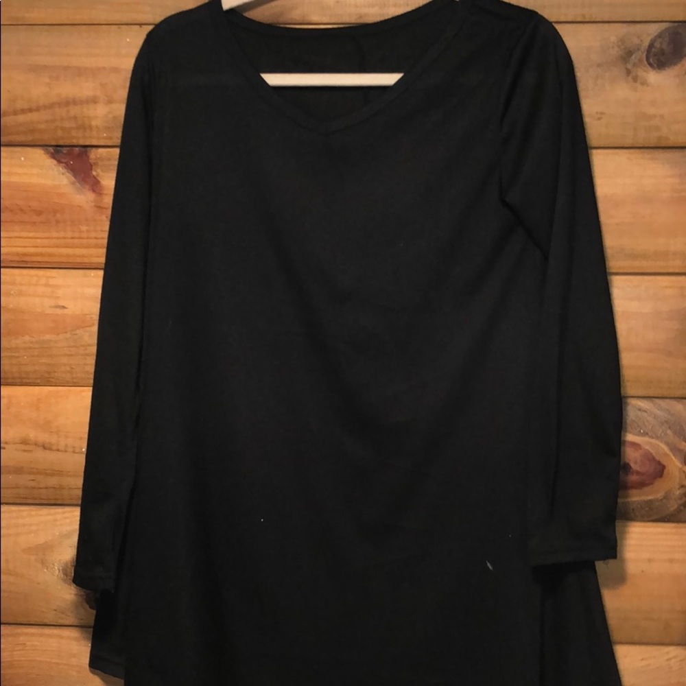 Asymmetrical tunic top size s/m worn once